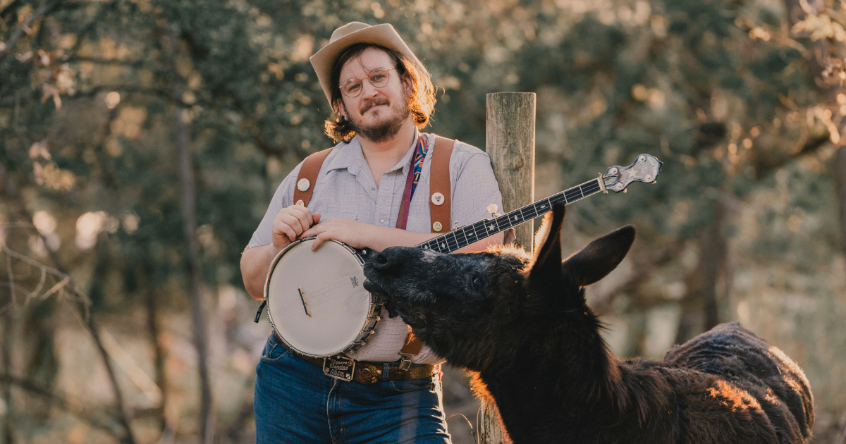 Singing Through Dark Times:  Willi Carlisle Finds Hope in Roaming and Reckoning