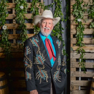 Bluegrass Hall of Famer, Doyle Lawson, wearing one of his signature bedazzled jackets.