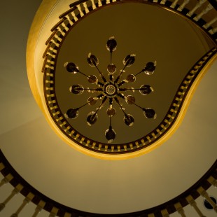 As you descend the staircase, take a glance upward.