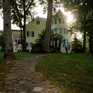 Down the path to the dock over your shoulder you'll notice the home's prominent tower.