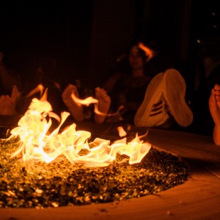 An unseasonably cool summer evening is the perfect occasion to light a fire to warm up a few toes.
