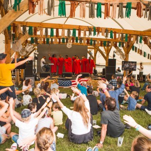 The crowd gets into Gospel Brunch.