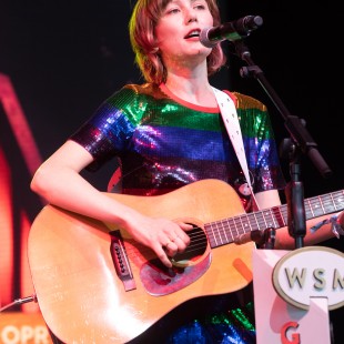 A rainbowy Molly Tuttle demonstrating her incredible clawhammer guitar style.