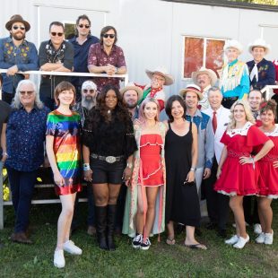 The entire cast of Grand Ole Opry at Bonnaroo gather backstage.