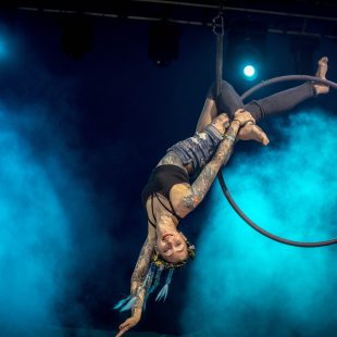 An aerialist entrances during Pert Near Sandstone.