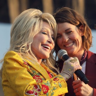Dolly Parton and Brandi Carlile share a smile.