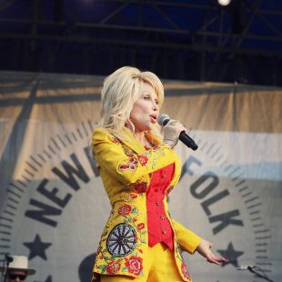 The well-deserved headline of Newport's Saturday night -- a surprise appearance by Dolly Parton herself.