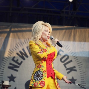 The well-deserved headline of Newport's Saturday night -- a surprise appearance by Dolly Parton herself.