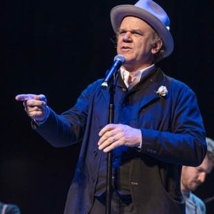 Only YOU can help fund music programs in schools and communities. - John C. Reilly, in this photo probably.