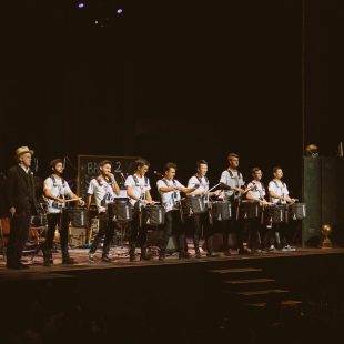 It is "Back 2 School," after all. The evening would not have been complete without a drum line.