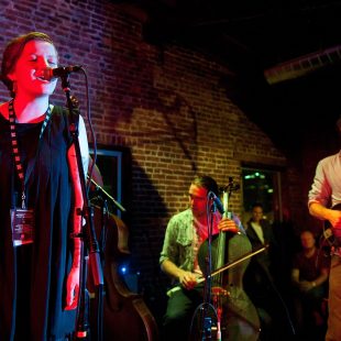 NASHVILLE, TN - SEPTEMBER 18: Nate Smith (center) performs with Emma Beaton and Jacob Jolliff of Joy Kills Sorrow during the Bluegrass Situation's showcase at the Americana Music Festival on September 18, 2013 in Nashville, United States. (Photo by Erika Goldring/Getty Images for Americana Music Festival) *** Local Caption *** Emma Beaton; Nate Smith; Jacob Jolliff