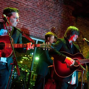 NASHVILLE, TN - SEPTEMBER 18: (L-R) Ed Helms, Ian Riggs, Larry Campbell and David Bromberg perform at the Bluegrass Situation showcase during the Americana Music Festival on September 18, 2013 in Nashville, United States. (Photo by Erika Goldring/Getty Images for Americana Music Festival) *** Local Caption *** Ed Helms; Ian Riggs