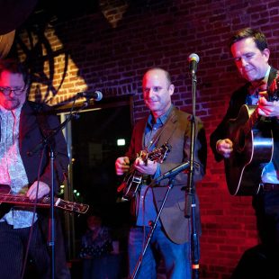 NASHVILLE, TN - SEPTEMBER 18: (L-R) Jerry Douglas, Jacob Tilove and Ed Helms perform at the Bluegrass Situation showcase during the Americana Music Festival on September 18, 2013 in Nashville, United States. (Photo by Erika Goldring/Getty Images for Americana Music Festival) *** Local Caption *** Ed Helms; Jacob Tilove