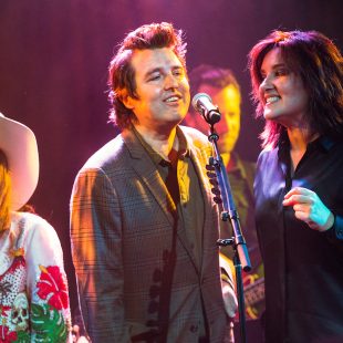 Sierra Ferrell, Kenneth Pattengale of Milk Carton Kids, and Brandy Clark during the grand finale of the AmericanaFest Pre-Grammy Salute to Lucinda Williams.