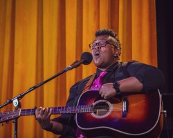 Crys Matthews sings and plays guitar.