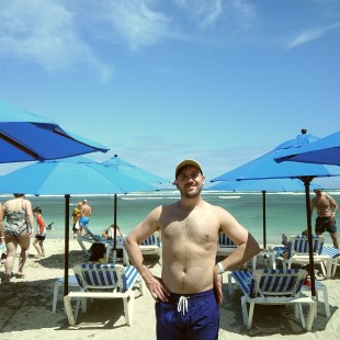 Jacob Sharp (of Mipso) poses on the beach during a port excursion.