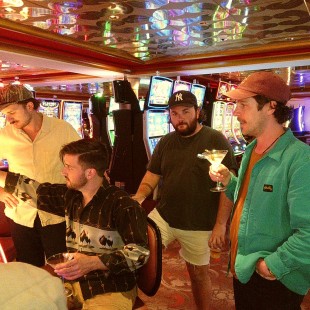 Mipso try their luck at the onboard casino.