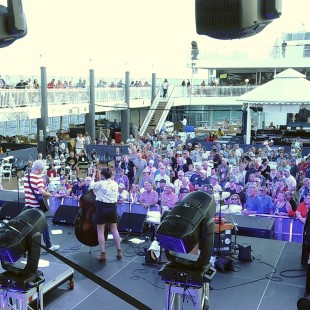 Rodney Crowell performs on the pool deck to a packed "house."