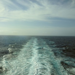 A beautiful horizon featuring the mighty wake of the Norwegian Pearl, viewed from the ship's stern.