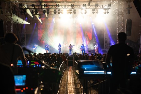 Trampled by Turtles and a packed main stage on night one of FreshGrass Bentonville. Photo by Cooper Baumgartner.