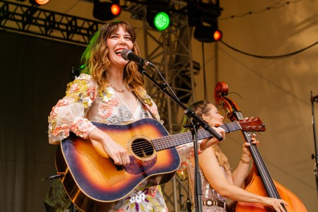 Molly Tuttle backgrounded by bassist Shelby Means. Photo courtesy of the Momentary.