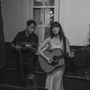 Madison Cunningham and Andrew Bird share a quiet moment backstage. By Josh Wool.