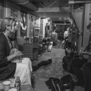 Rhiannon Giddens and Dirk Powell warm up backstage at the Jane Pickens Theater for A Bluegrass Situation. By Josh Wool.