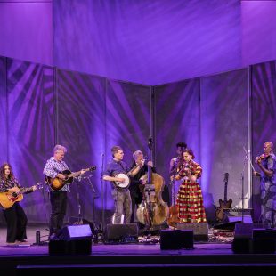 Ed Helms joins Rhiannon Giddens and band on stage for "Clinch Mountain Backstep."
