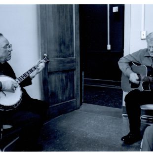 Earl Scruggs and Doc Watson backstage during filming of 'The Three Pickers.'